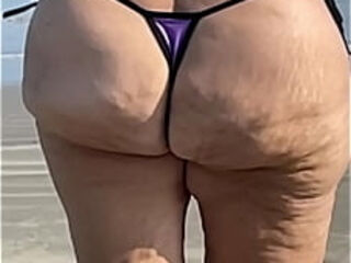 Swinger wife at the beach